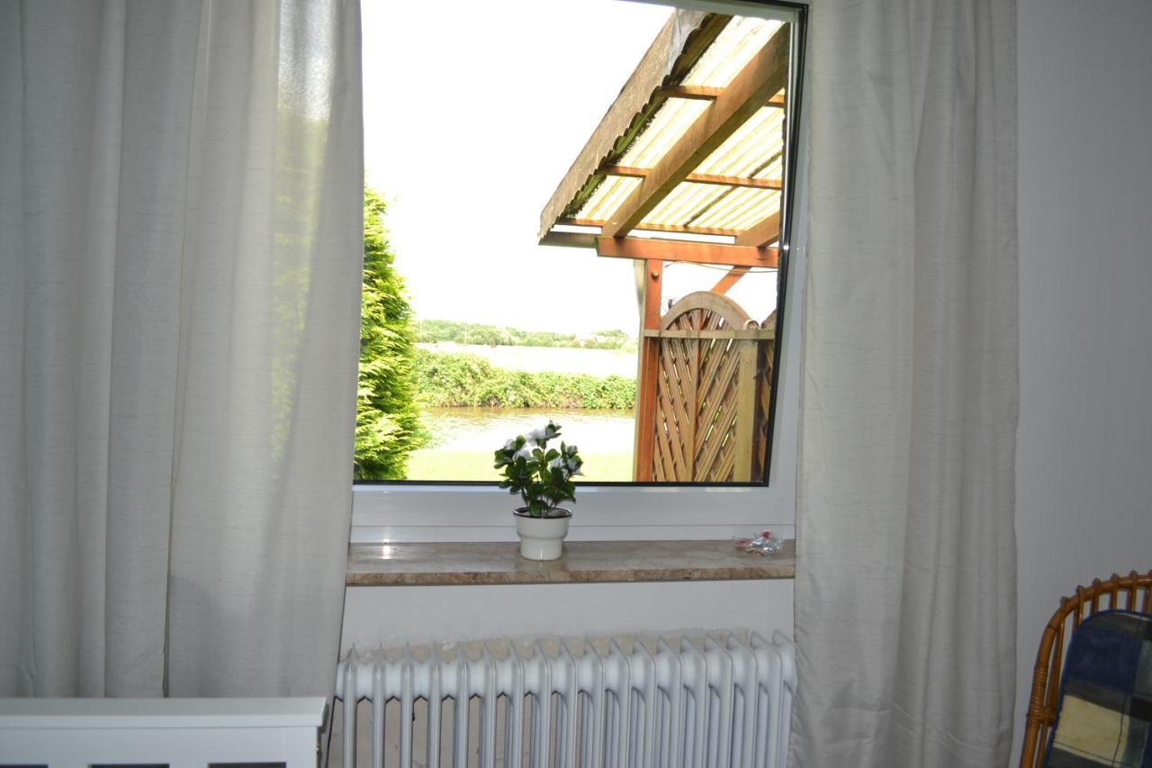 Ferienhaus Am Wasser Hinte ภายนอก รูปภาพ
